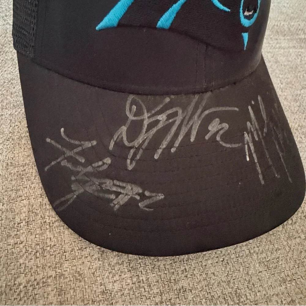 North Carolina NC Panthers Black Trucker Hat with Teal Logo 47 signed autograph